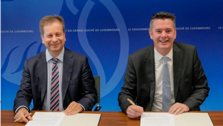 Luka Mucic, Vodafone, and Luxembourg Minister of the Economy Lex Delles signing the agreement for Vodafone's pan-European logistics hub in Luxembourg